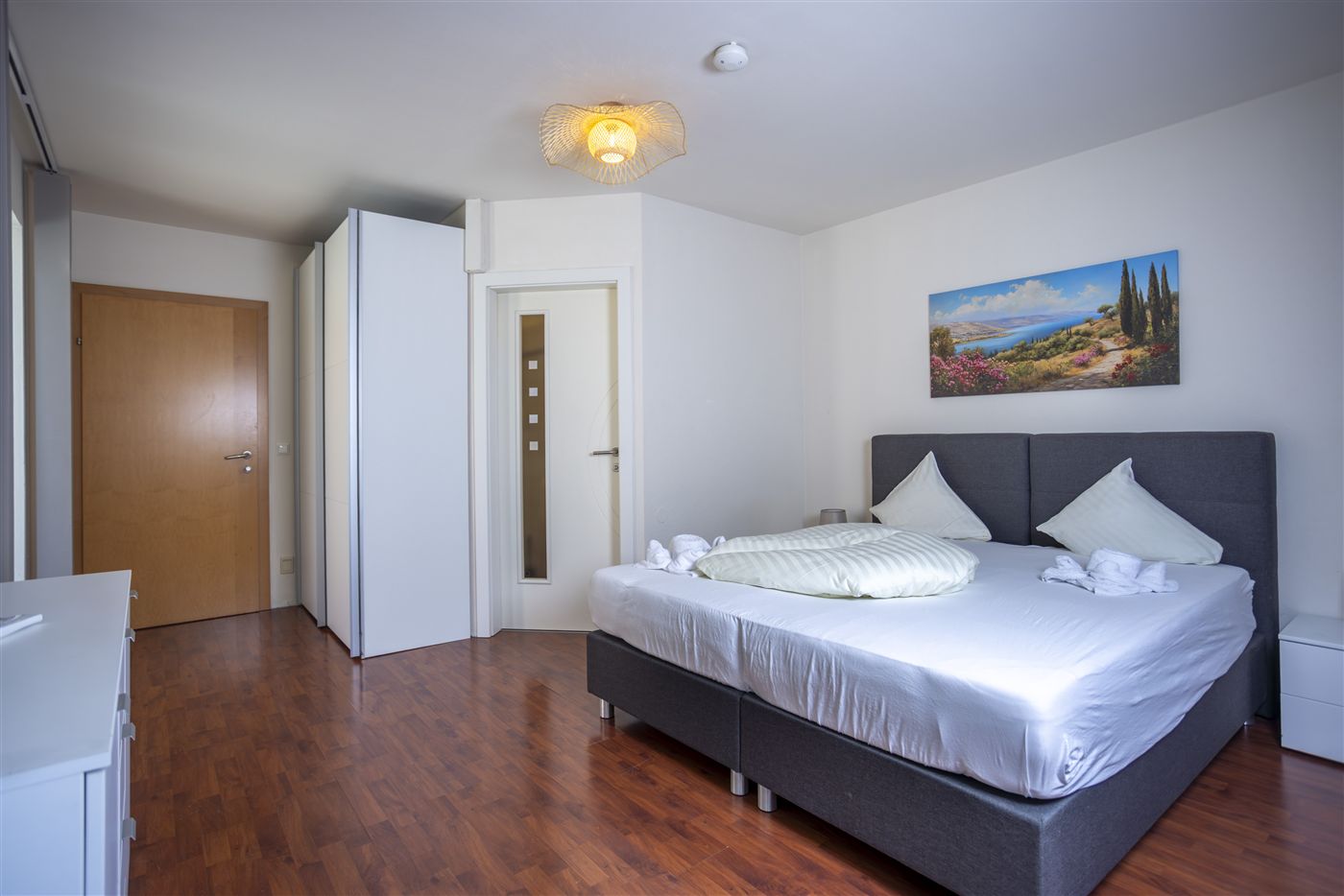 Doppelbett im Apartment Mediterranea